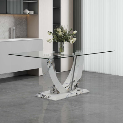 Une table rectangulaire moderne et simple en verre, équipée d'une table en verre trempé de 0,39 pouce, de pieds à densité moyenne et de tablettes de soutien en acier inoxydable. Utilisé dans la cuisine, la salle à manger F-907