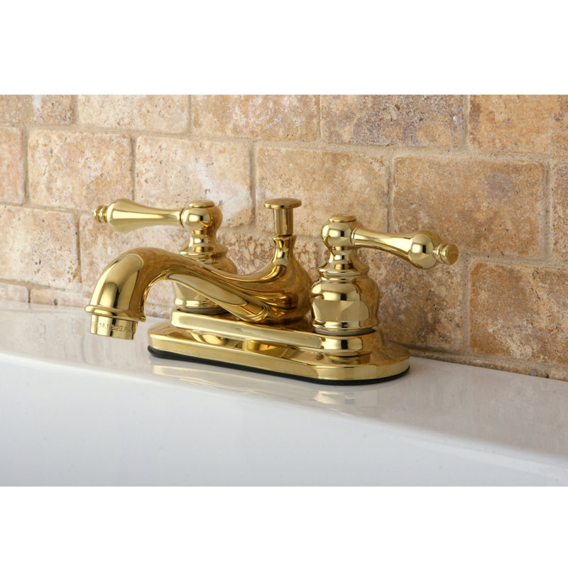 Robinet de salle de bain central à fixation à deux poignées à 3 trous à fixation sur le comptoir 4 po Kingston, Laiton poli