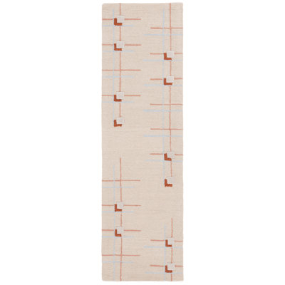 Tapis géométrique beige / rouille en laine / coton touffeté à la main Juliam