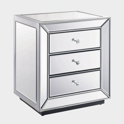Meuble à trois tiroirs au fini miroir perlé pour un rangement élégant et un décor moderne, idéal pour les salons et les chambres.