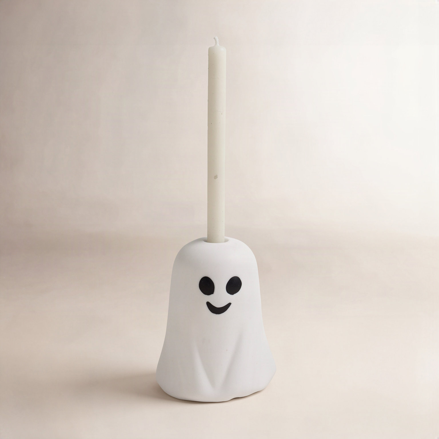 Tall Stoneware Ghost Shaped Taper Holder, 2.38" H x 2" W x 2.25" D