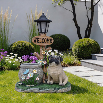 Statue de planteur de chien carlin assis