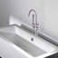 Robinet de baignoire autoportant avec douche à main en nickel pressé