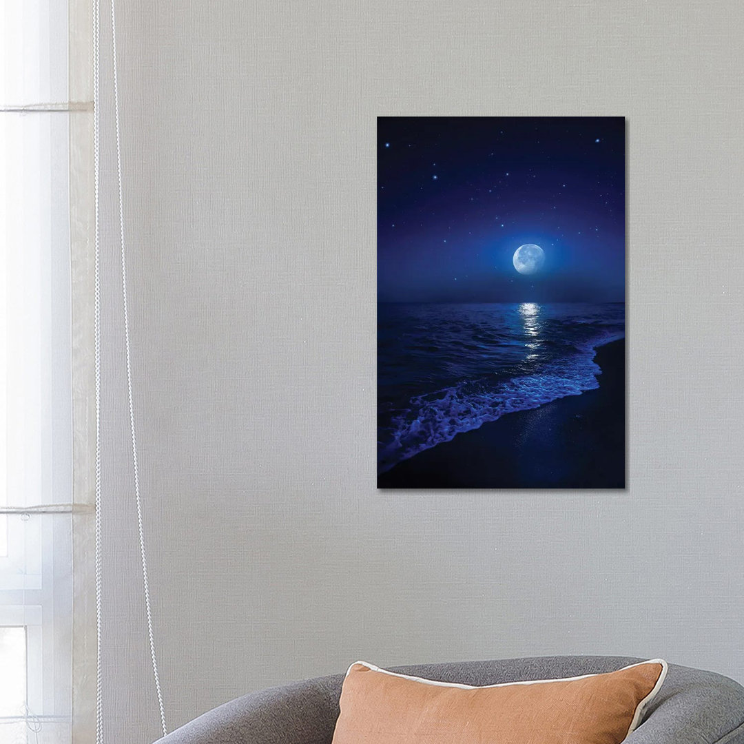 Tranquil Ocean At Night Against Starry Sky And Moon