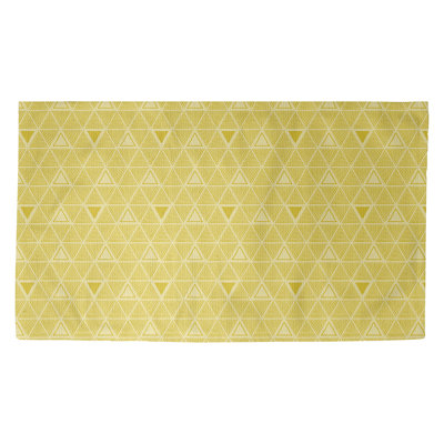 Tapis jaune à motif de triangles dessinés à la main