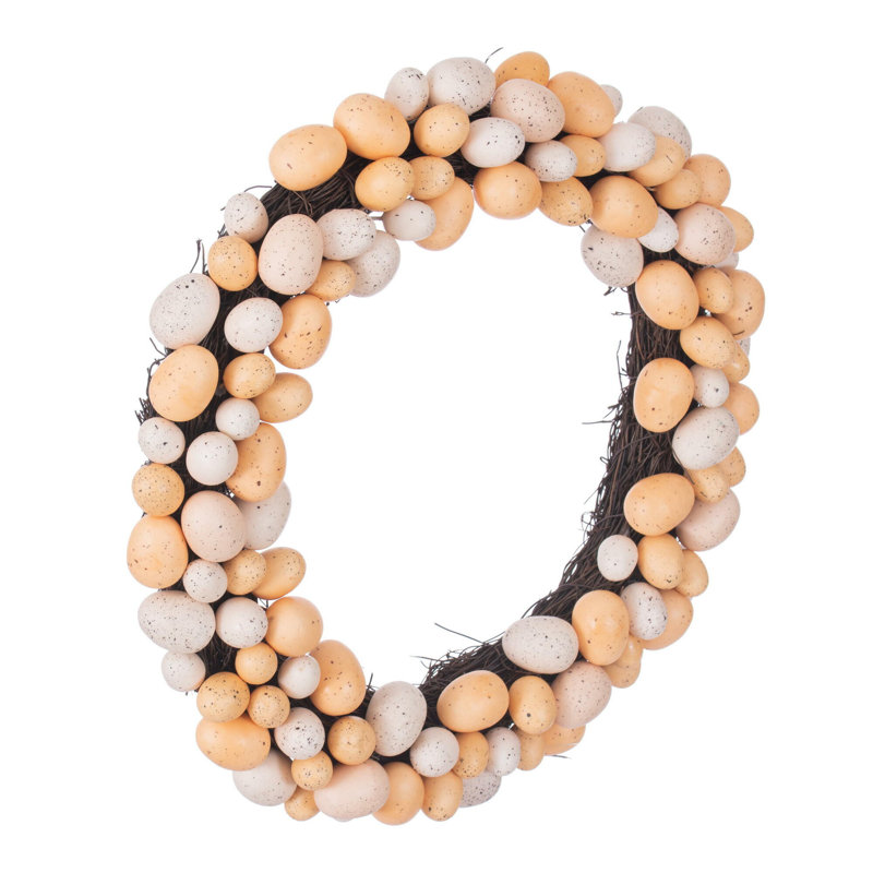 The Holiday Aisle® 18" Artificial Easter Eggs Wreath. Features Easter eggs on a grapevine base., Pastel Orange