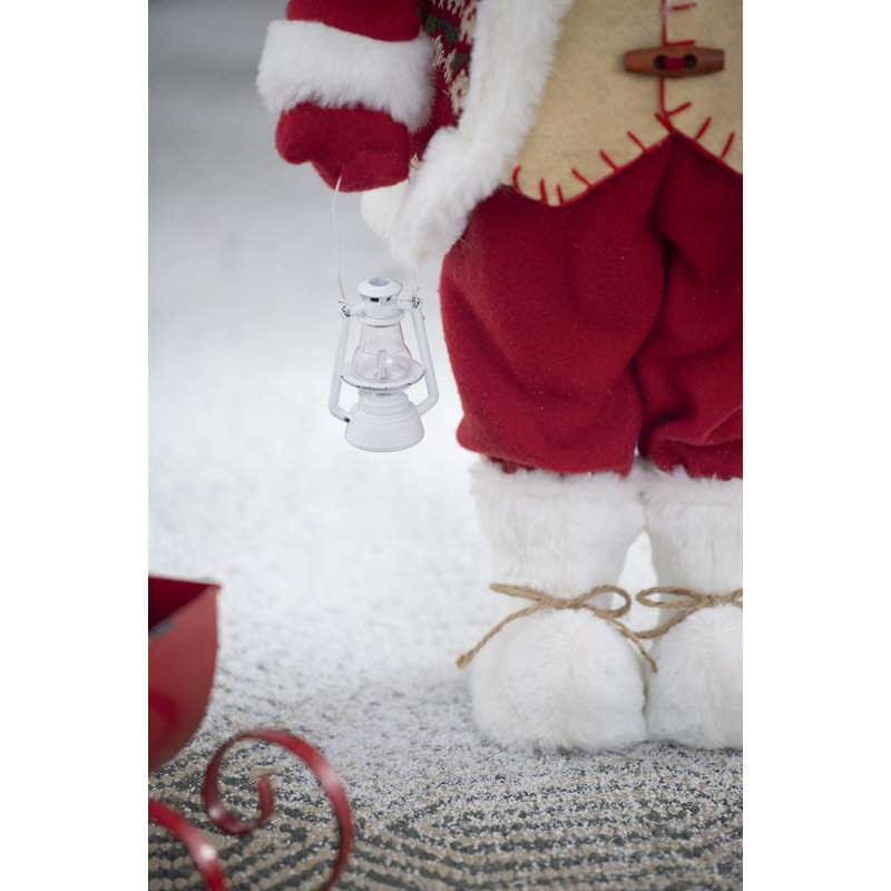 Figurine de père Noël avec lanterne