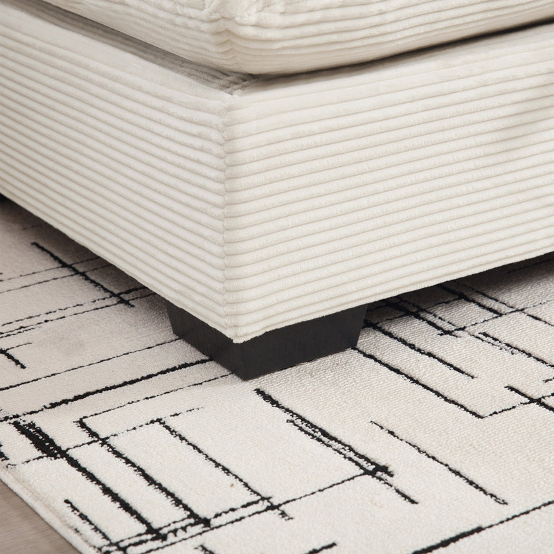 Grand canapé modulaire en forme de L avec repose-pieds avec rangement et 4 coussins de taille