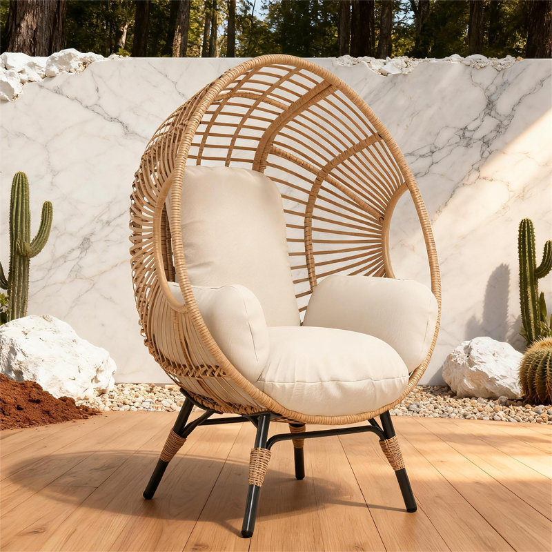Fauteuil intérieur / extérieur en osier avec coussins