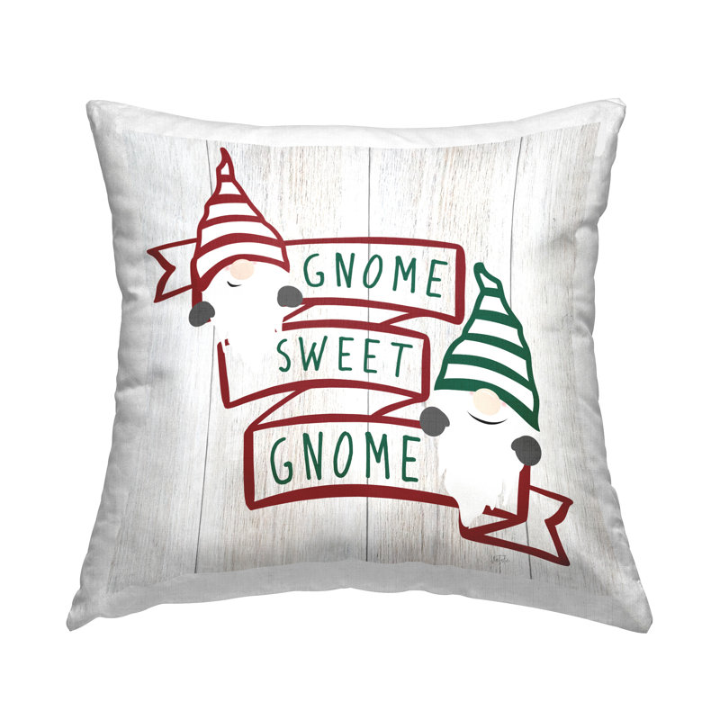 Coussin décoratif accueillant avec motif de gnomes rouges et verts accueillant par Natalie Carpentieri