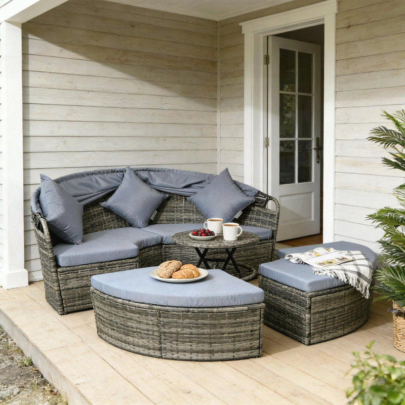 Versatile Outdoor Rattan Daybed Set with Retractable Canopy and Adjustable Table for Patio and Poolside Relaxation