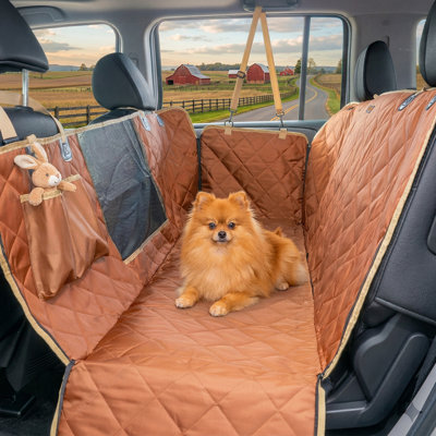 Rear seat cover for canines suitable for sport utility vehicles and small trucks, waterproof heavy-duty pet hammock incorporating mesh viewing window, durable scratch-resistant barrier compatible with RAV4, CR-V, and Jeep models.