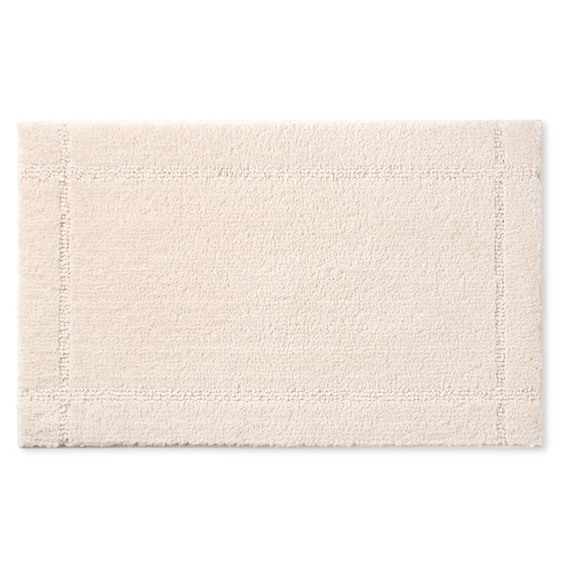 Tapis de bain lavable à la machine à bordure touffetée ultra moelleux Town and Country Country 20 po x 32 po, Beige