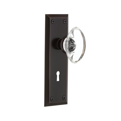 Bouton de porte de mortaise intérieure ovale en cristal avec plaque longue New York