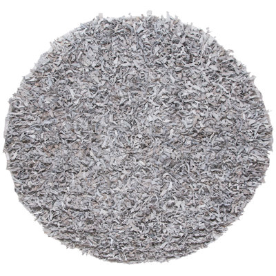 Tapis en cuir tissé à la main de couleur unie Godsey
