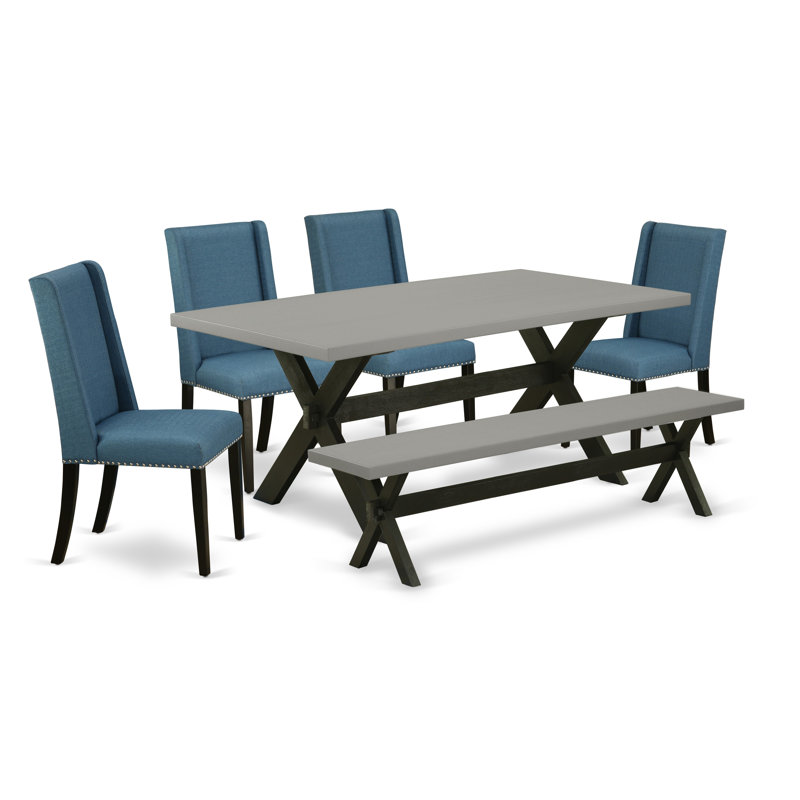 L'ensemble de salle à manger 6 pièces contient une table de salle à manger rectangulaire avec des pieds en X et 4 chaises rembourrées en tissu de lin bleu avec un banc, noir brossé