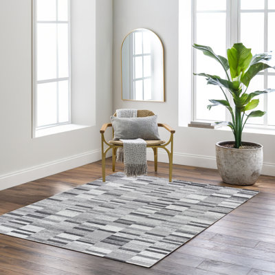 Beyanka Abstract Machine Tufted Area Rug