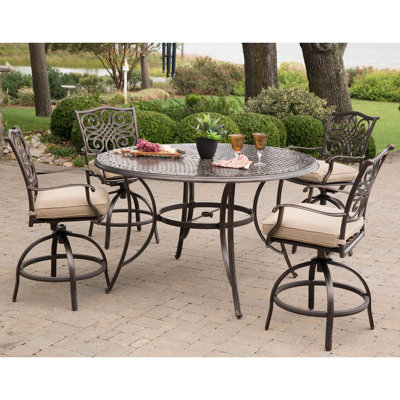 Carleton 4 - Person Patio Dining Set with Round Table , Cushions Included