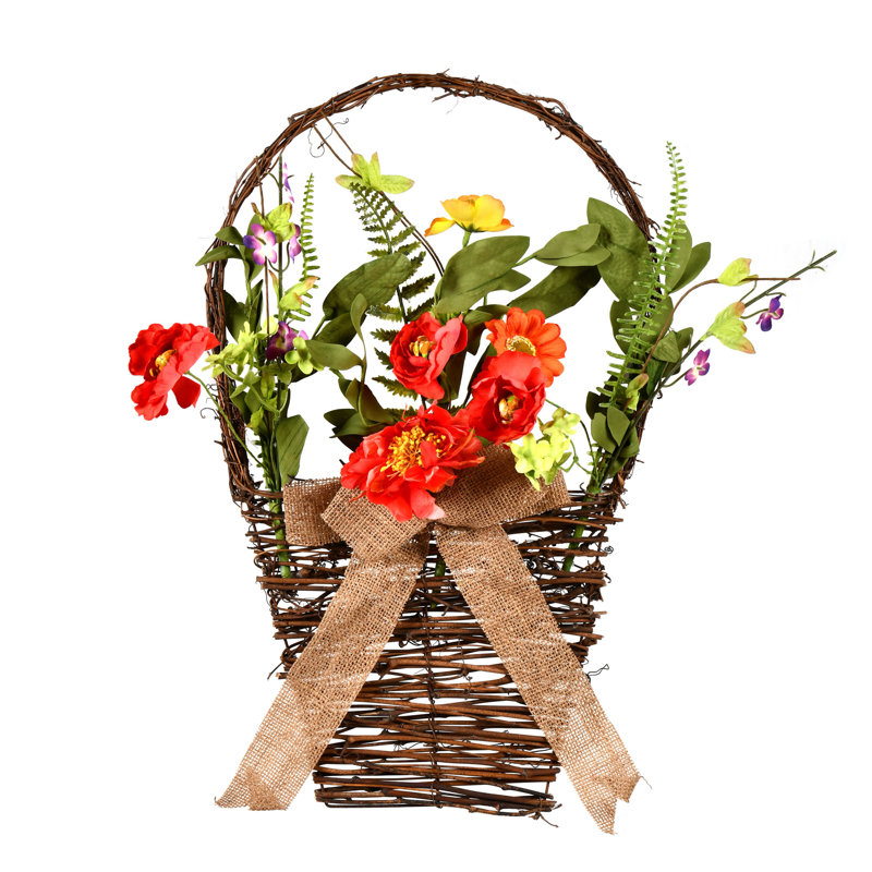 Arrangement de fleurs mélangé artificiel dans un panier