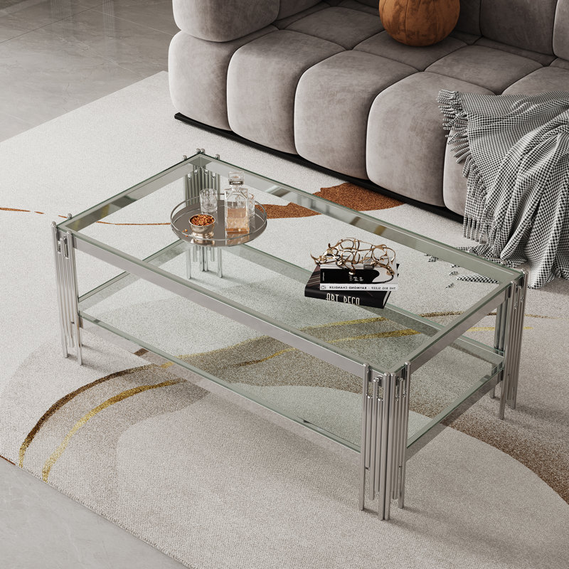 Tempered glass coffee table with double layers and mirror-finished stainless steel frame, durable and elegant