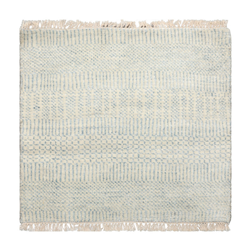 Tapis oriental ivoire en laine et  2 pi x 2 pi
