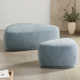 Adna 44'' Triangular Upholstered Ottoman
