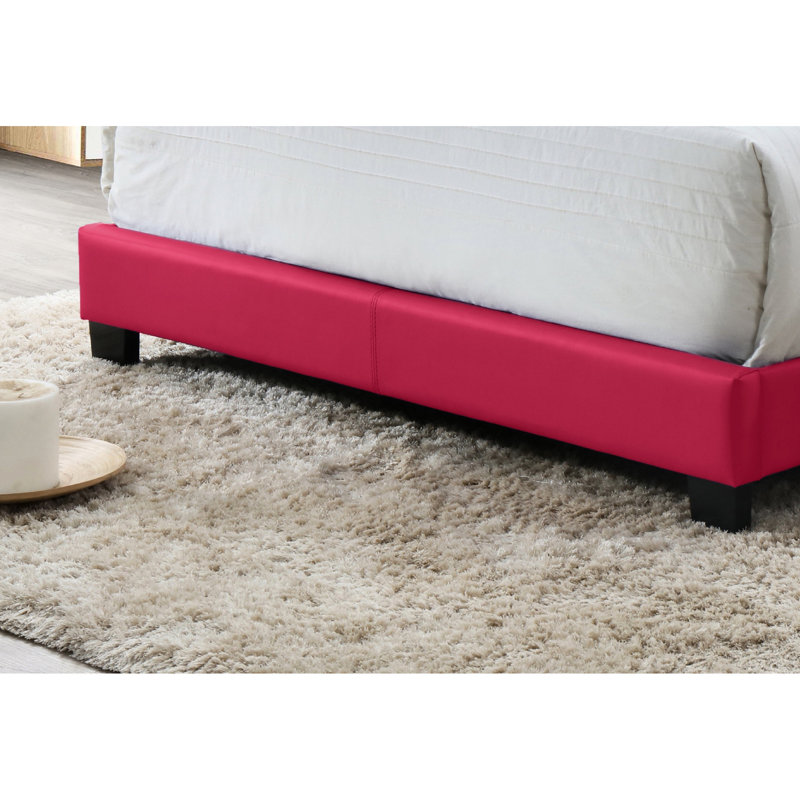 Lit plateforme moderne avec passe-partout rose et tissu