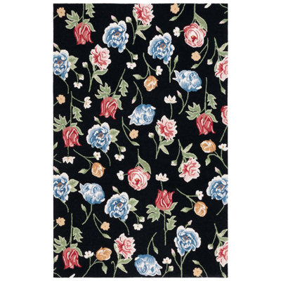 Leitha Hand Tufted Wool/Cotton Floral Rug in Black/Red