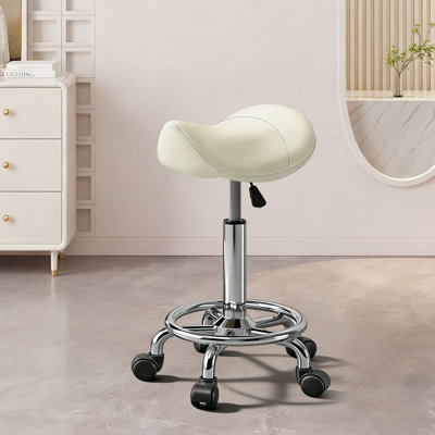 Tabouret à roulettes beige réglable avec pédale à anneaux pour espaces de travail médicaux et de dessinateur