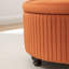 Repose-pieds rond avec rangement en velours Bula-943753770