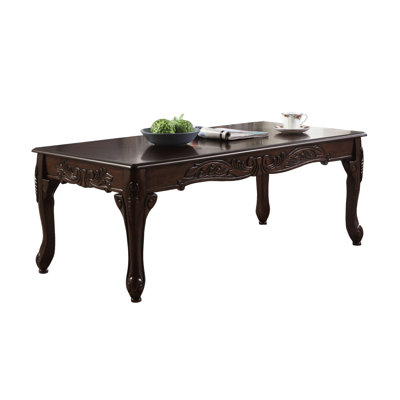 Table basse en bois de cerisier foncé de style traditionnel avec un charme captivant dans les détails pour une présence gracieuse