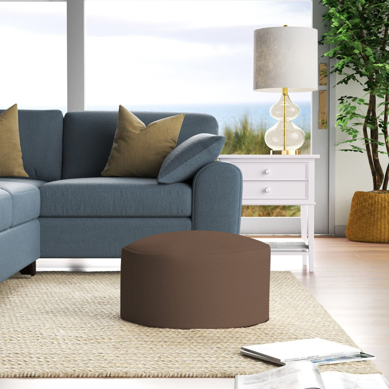 Repose-pieds repose-pieds rond de couleur unie en mélange de polyester 22" Damion, Chocolat