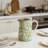 Ceramic White Pitcher Vase With Green Floral Pattern