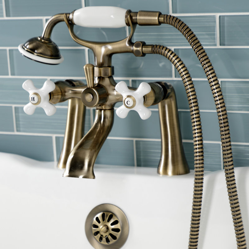 Kingston Brass Kingston Three-Handle 2-Hole Deck Mount Clawfoot Tub Faucet with Hand Shower, Antique Brass