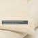 Handgefertigter Teppich Pinney aus Wolle in Beige