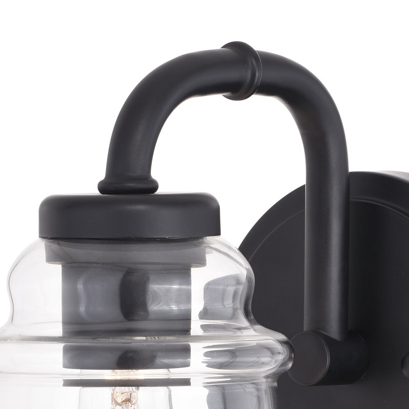 Luminaire de salle de bain industriel noir mat à 1 lumière de 5,25 pouces de large Akini, abat-jour en verre transparent, à intensité variable, compatible avec DEL, applique murale en acier