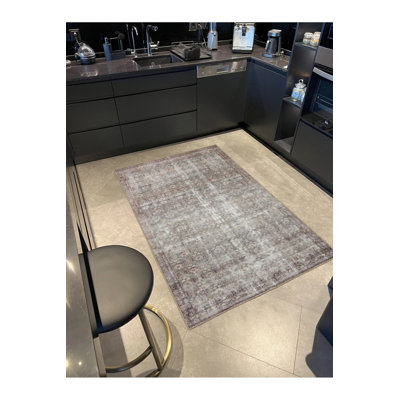 Tapis décoratif gris à motif géométrique traditionnel lavable