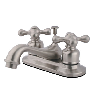 Kingston Brass Restoration Two-Handle 3-Hole Deck Mount 4" Centerset Bathroom Faucet with Plastic Pop-Up