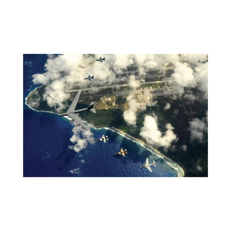 A B-52 Stratofortress Leads A Formation Of Aircraft Over Guam II by Stocktrek Images - Wrapped Canvas Print