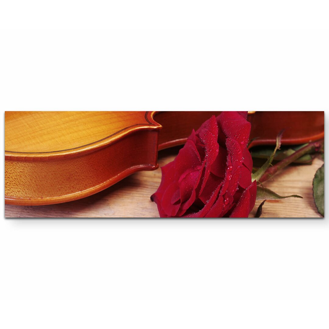 Leinwandbild Violine mit roter Rose