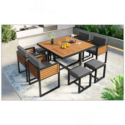 Ensemble de salle à manger de jardin en bois d'acacia 9 pièces GO, ensemble de patio extérieur peu encombrant, 4 chaises rembourrées et 4 repose-pieds et 1 table carrée, pour la cour, le jardin, la terrasse et le bord de la piscine, gris