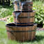 Fontaine d'extérieur à 3 niveaux en tonneau de bois brun résistant aux intempéries