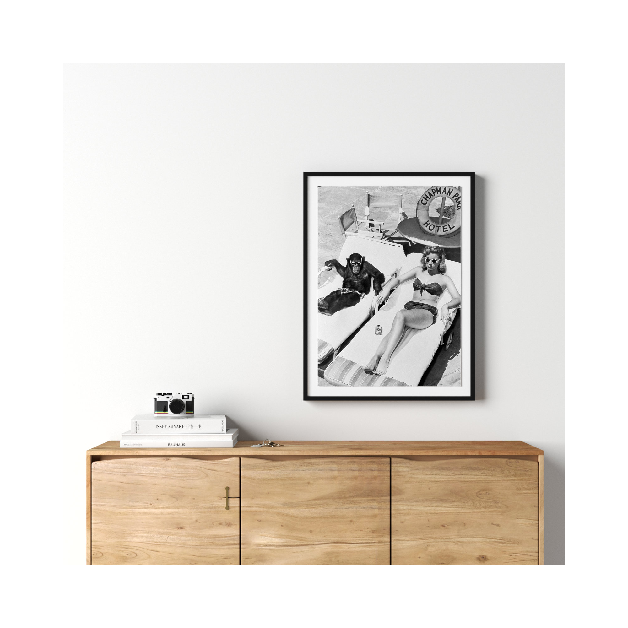 Woman Sunbathing With Chimpanzee by Getty Images, Black Maple Framed, 32" H x 24" W
