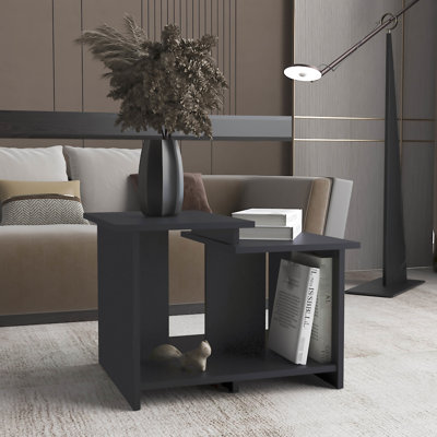 Table basse noire avec tablette ouverte, s'adapte aux tablettes de style bureau moderne pour les salons élégants