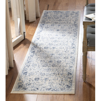 Jase Oriental Ivory/Blue Area Rug