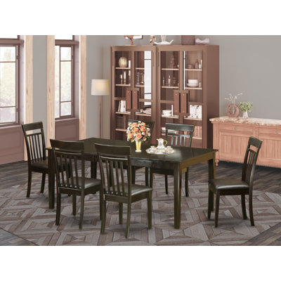 Ensemble de table de salle à manger 7 pièces comprenant une table de cuisine rectangulaire avec piédestal et 6 chaises de salle à manger rembourrées en similicuir