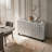 Modern Glam 59.5" Silver Leaf Accent Cabinet Featuring Geometric Textured Doors