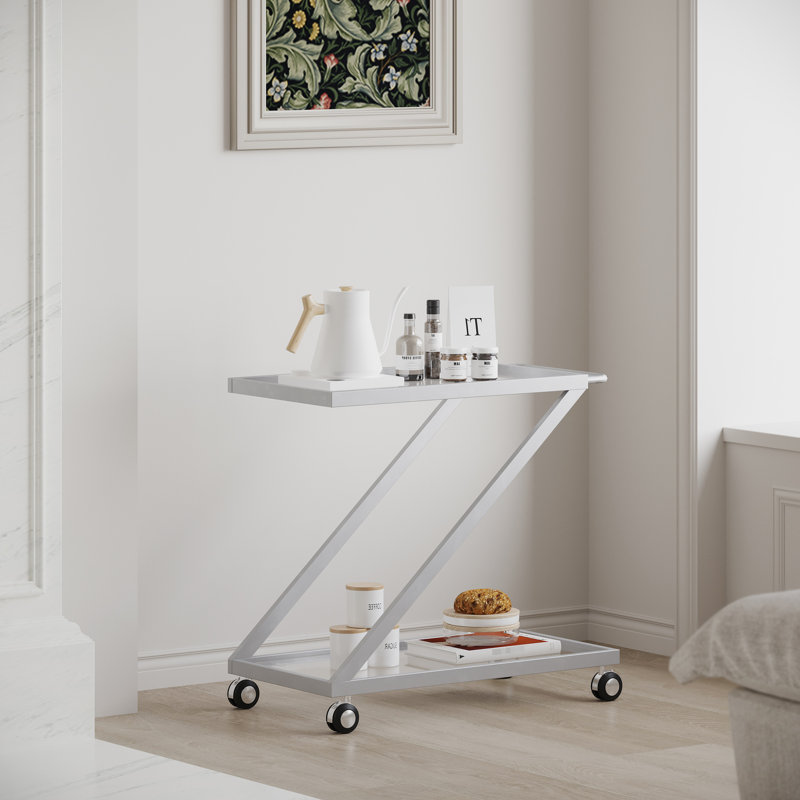 Élégant chariot-bar avec base en verre incassable et en fer stable, tablettes élégantes et minimalistes