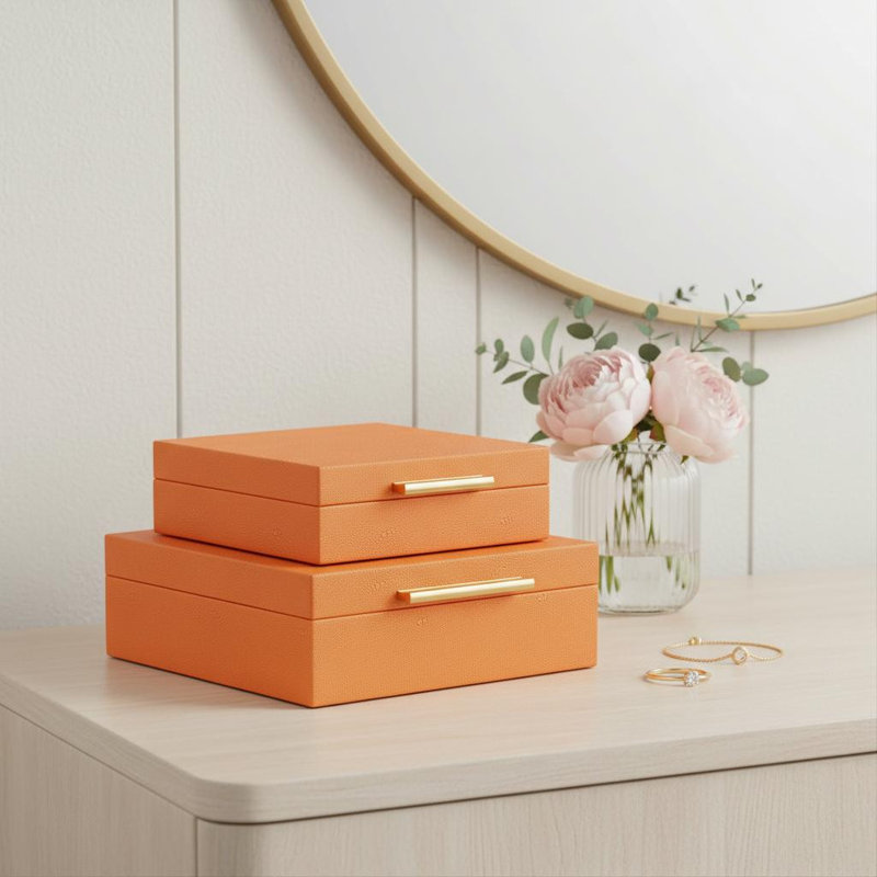 Ensemble de deux boîtes à bijoux en similicuir galuchat orange avec accessoires décoratifs