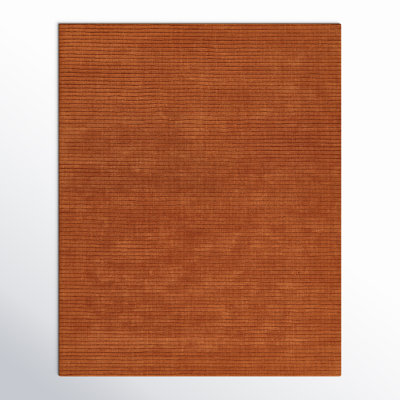 Guiness Solid Color Hand Loomed Wool Area Rug in Orange